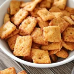 Crispy, low-carb snacks from a keto cheese crackers recipe served in a white bowl, perfect for guilt-free munching.
